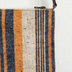 Bolso pequeño artesanal elaborado con tejido vintage a rayas y piel de serraje